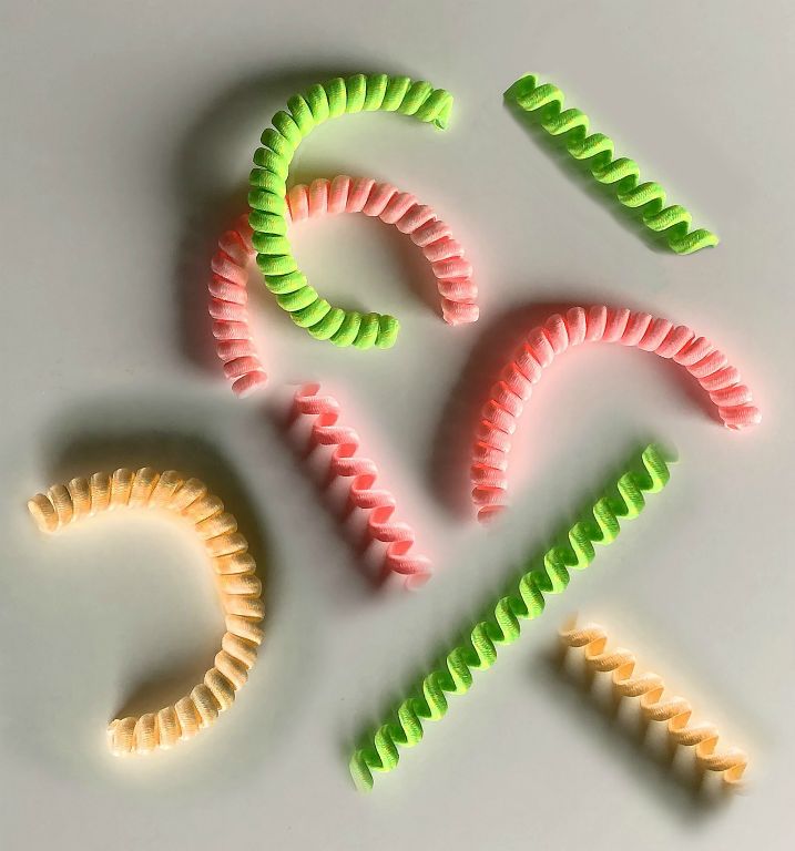 Researchers at MIT fabricated very small material they call “nano yarn.”  This image is a visual metaphor, using coiling fabric to suggest the structure of the “yarn.” Felice Frankel
